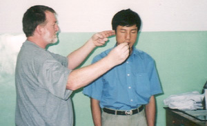 Allan treating Dr Cai Jun with Special Chi Techniques